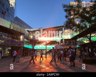 Beijing, China. 29th Aug, 2019. Mobile photo shows people visiting Sanlitun business area in Beijing, capital of China, Aug. 29, 2019. Credit: Zhang Yudong/Xinhua/Alamy Live News Stock Photo
