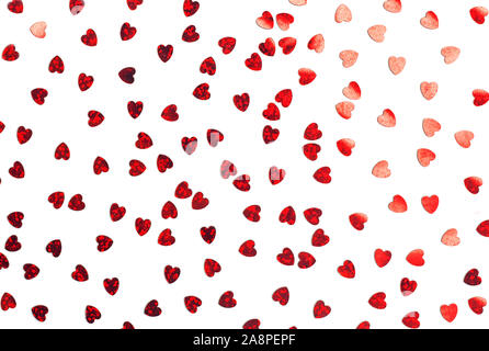 Red hearts confetti isolated on white. Valentine's day background with hearts. Romantic love pattern. Stock Photo
