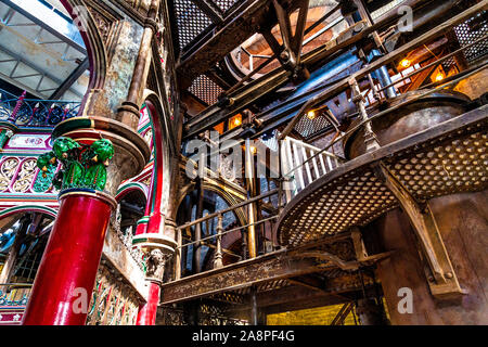 Partially restored colourful decorative ironwork of The Octagon at the Victorian Crossness Pumping Station, UK Stock Photo