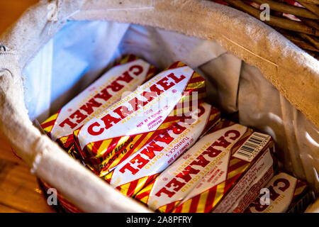 Caramel chocolate bars in a basket Stock Photo