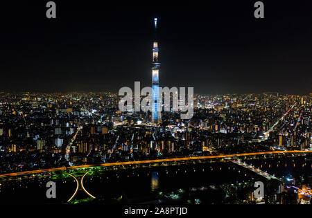 Aerial view of Tokyo Skytree, Sumida river, and Japanese landscape in Tokyo city at night. Japan tourism, cityscape landmark, Asia travel destination Stock Photo