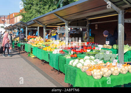Outdoor fruit and vegetable stalls at Leeds Kirkgate Market, Kirkgate, Leeds, West Yorkshire, England, United Kingdom Stock Photo