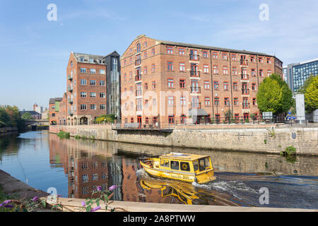 Victoria Bridge and warehouses across River Aire, Leeds, West Yorkshire, England, United Kingdom