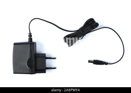 Black power ac to dc adaptor. Power adapter of router isolated on white background. High resolution photo. Full depth of field. Stock Photo