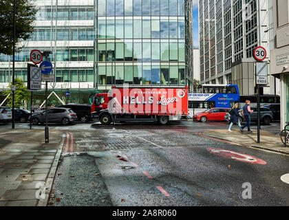 A Camden Hells Lager delivery lorry waiting in traffic in London. Stock Photo