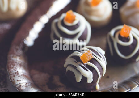 Chocolate pralines with candy apricot Stock Photo