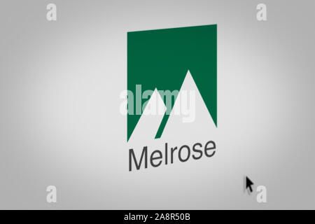 Logo of the public company Melrose Industries displayed on a computer screen in close-up. Credit: PIXDUCE Stock Photo