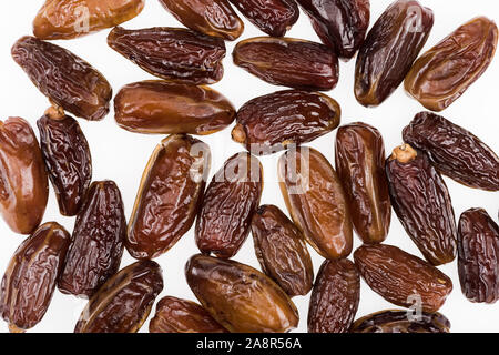 top view of tasty dried dates isolated on white Stock Photo
