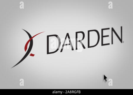 Logo of the public company Darden Restaurants displayed on a computer screen in close-up. Credit: PIXDUCE Stock Photo