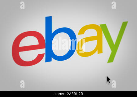 Logo of the public company eBay Inc. displayed on a computer screen in close-up. Credit: PIXDUCE Stock Photo