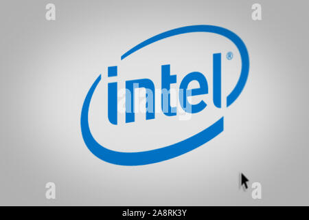 Logo of the public company Intel Corp. displayed on a computer screen in close-up. Credit: PIXDUCE Stock Photo