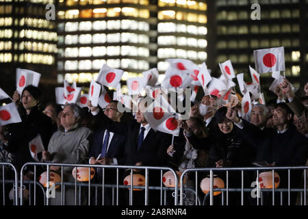 Tokyo, Japan. 9th Nov, 2019. Wellwishers wave Japan's national flags and lanterns to Japanese Emperor Naruhito and Empress Masako at a celebration event for the emperor's assession to throne at the Imperial Palace in Tokyo on Saturday, November 9, 2019. Credit: Yoshio Tsunoda/AFLO/Alamy Live News Stock Photo