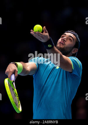 London, UK. 10th Nov, 2019. Matteo Berrettini of Italy serves during the singles group match against Novak Djokovic of Serbia at the ATP World Tour Finals 2019 in London, Britain on Nov. 10, 2019. Credit: Han Yan/Xinhua/Alamy Live News Stock Photo