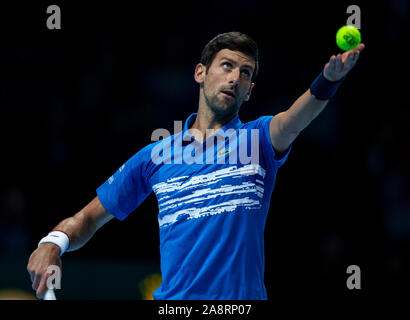 London, UK. 10th Nov, 2019. Novak Djokovic of Serbia serves during the singles group match against Matteo Berrettini of Italy at the ATP World Tour Finals 2019 in London, Britain on Nov. 10, 2019. Credit: Han Yan/Xinhua/Alamy Live News Stock Photo