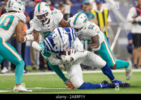 Miami Dolphins linebacker Raekwon McMillan (52) walks the sidelines, during  the second half of an NFL preseason football game against the Tampa Bay  Buccaneers, Thursday, Aug. 9, 2018, in Miami Gardens, Fla. (