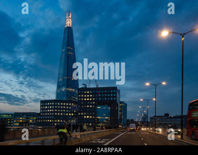 The Shard from the streets of London City at dawn Stock Photo