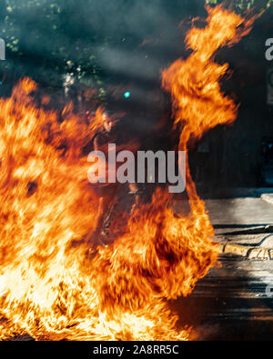 Santiago de Chile. Chile. 06 November 2019. People protesters preparing Barricades with fire and objects in Providencia neighborhood at Santiago streets Stock Photo