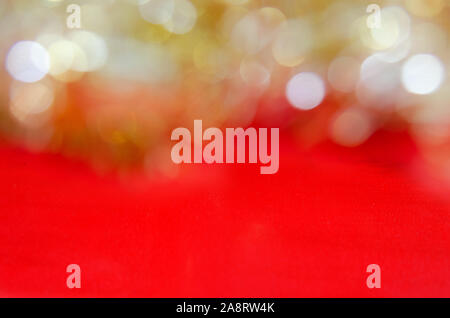 Abstract blurred yellow bokeh on  red background Stock Photo