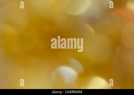 Abstract blurred yellow bokeh on  background Stock Photo