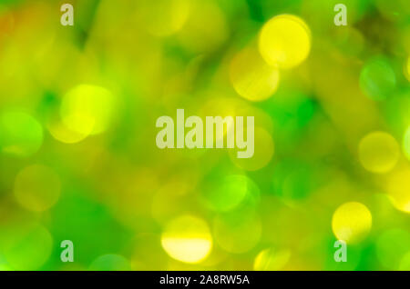 Abstract blurred yellow and green bokeh on  background Stock Photo
