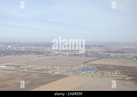 An aerial landscape of farmland and residential areas in central Illinois Stock Photo