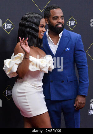 Santa Monica, USA. 10th Nov, 2019. Todd Tucker and singer Kandi Burruss arrives for the 45th annual E! People's Choice Awards at the Barker Hangar in Santa Monica, California on Sunday, November 10, 2019. Photo by Jim Ruymen/UPI Credit: UPI/Alamy Live News Stock Photo