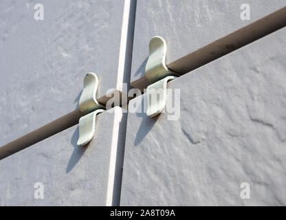 Fragment of a building cladding with ceramic tiles Stock Photo