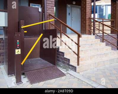 Voronezh, Russia -  June 11, 2019: Entrance of a new residential building equipped with a lift for people with disabilities Stock Photo