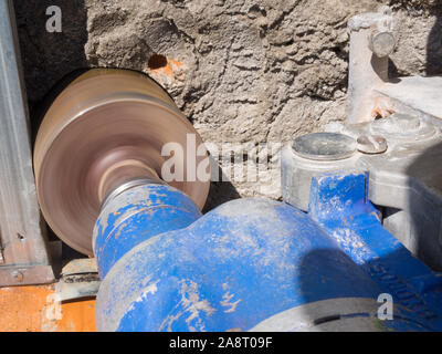 Drilling holes in the foundation with a specialized installation Stock Photo