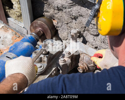 Voronezh, Russia -  June 11, 2019: Drilling holes in the foundation using a specialized installation Stock Photo