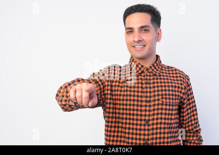 Portrait of happy Persian hipster man pointing at camera Stock Photo