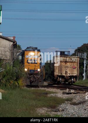 This photograph of a train was taken in Lake Alfred, Florida during 2014. It shows the train on a short spur track at a local business. Stock Photo