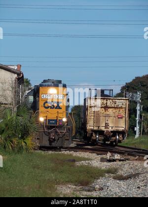 This photograph of a train was taken in Lake Alfred, Florida during 2014. It shows the train on a short spur track at a local business. Stock Photo