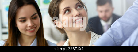 Pretty colleagues in high-tech building Stock Photo