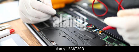 Male hands in white protective glove hold Stock Photo