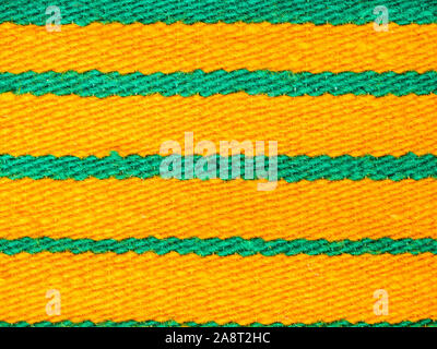 Bright yellow and green striped woven wool Stock Photo