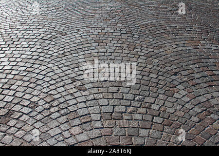 pattern of cobblestones on a pedestrian promenade in the tourist and fishing village of Porto Recanati in Italy on the Adriatic coast Stock Photo
