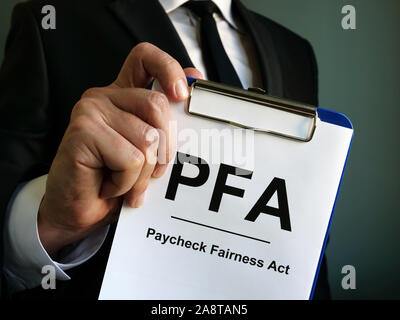 Boss is holding Paycheck Fairness Act PFA. Stock Photo