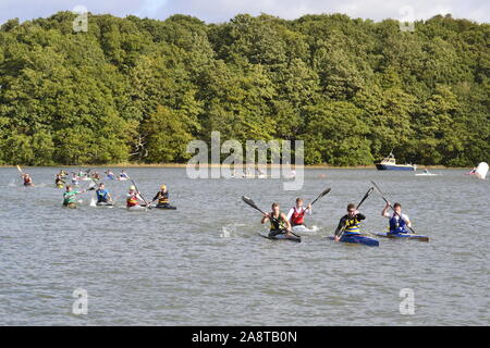 Canoe racing on the River Hamble. View from the jetty in River Hamble Country Park. Hasler Finals 2019 Stock Photo