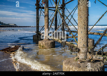 Selective focus on the underneath of a pier on the Norfolk coast Stock Photo