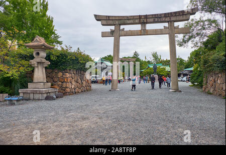 OSAKA, JAPAN - OCTOBER 14, 2019 The view of the main torii gate to the territory of Hokoku Shrine in the Osaka Castle. Osaka. Japan Stock Photo