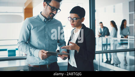 Group of business people collaborating in office Stock Photo