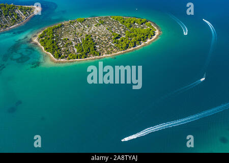 Beautiful Mediterranean stone islands on Croatian coast, Murter archipelago coastline, aerial view of turquoise bays and yachts from drone Stock Photo