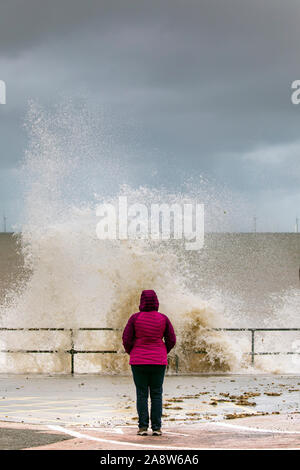 Colwyn Bay, North Wales, UK. 11th November 2019. Uk Weather Wet and windy at for many today with dangerous conditions on coastal areas with high tides causing huge waves as seen at Colwyn Bay in North Wales Credit: DGDImages/Ģ����ý Live News Stock Photo