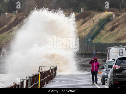 Colwyn Bay, North Wales, UK. 11th November 2019.UK Weather Wet and windy at for many today with dangerous conditions on coastal areas with high tides causing huge waves as seen at Colwyn Bay in North Wales Credit: DGDImages/Ģ����ý Live News Stock Photo