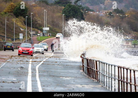 Colwyn Bay, North Wales, UK. 11th November 2019. UK weather Wet and windy at for many today with dangerous conditions on coastal areas with high tides causing huge waves as seen at Colwyn Bay in North Wales Credit: DGDImages/Ģ����ý Live News Stock Photo