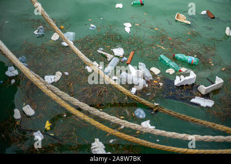 plastic waste in port water Stock Photo
