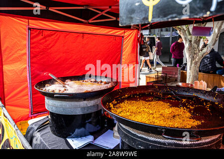 Melbourne, Australia - October 20, 2019: Large frying pans with street food during festival Stock Photo