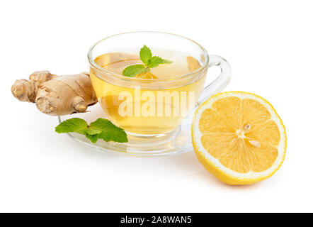 Hot herbal tea with mint leaves, ginger and lemon isolated on white background with soft shadow Stock Photo