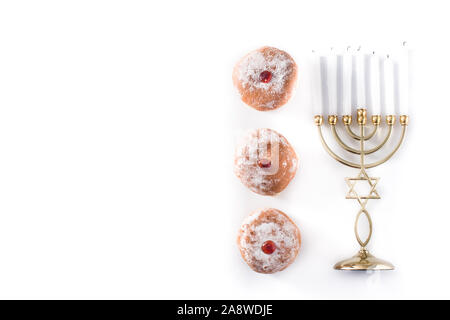 Jewish Hanukkah menorah and sufganiyot donuts isolated on white background. Copy space Stock Photo